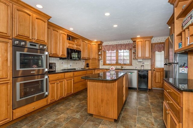 kitchen with open shelves, appliances with stainless steel finishes, brown cabinets, and tasteful backsplash