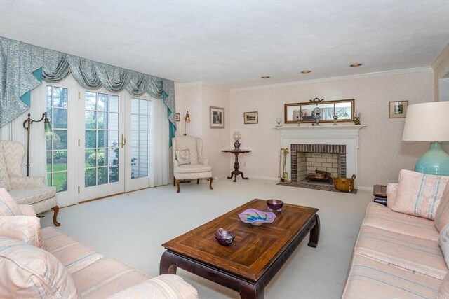living area featuring wallpapered walls, carpet flooring, a brick fireplace, and ornamental molding
