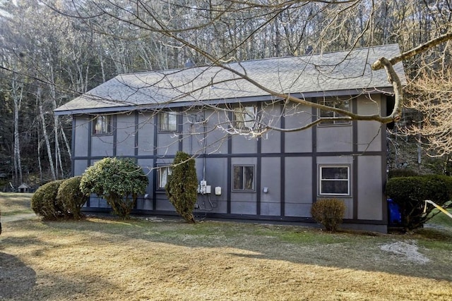 view of outbuilding with a lawn