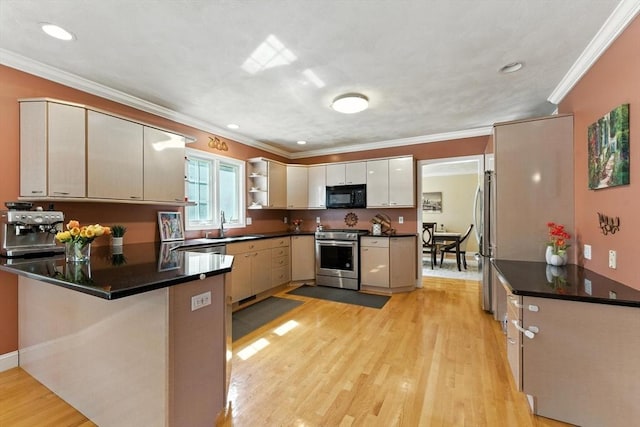22 Campbell Rd, Middleton, MA 01949 - kitchen with stainless steel appliances, a peninsula, ornamental molding, light wood-style floors, and open shelves