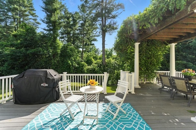 22 Campbell Rd, Middleton, MA 01949 - wooden deck with a grill and outdoor dining space