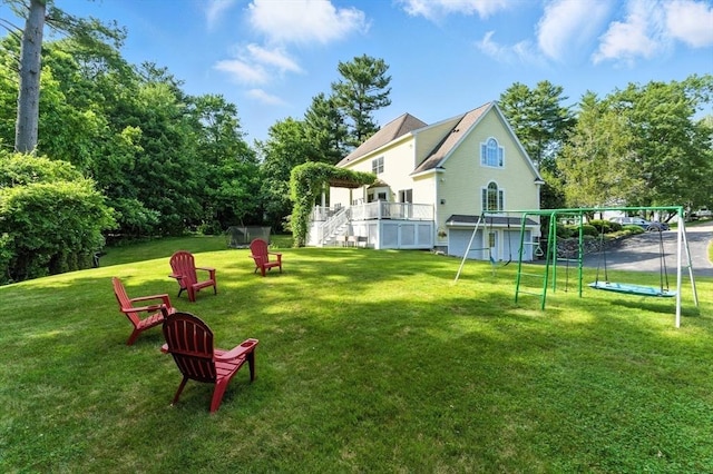 22 Campbell Rd, Middleton, MA 01949 - view of grassy yard with a playground