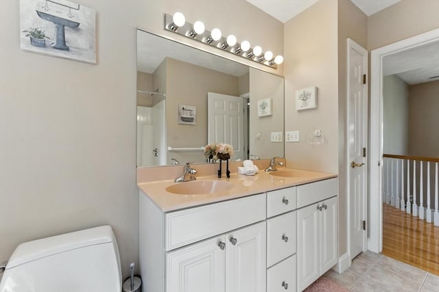 22 Campbell Rd, Middleton, MA 01949 - bathroom with double vanity and tile patterned floors