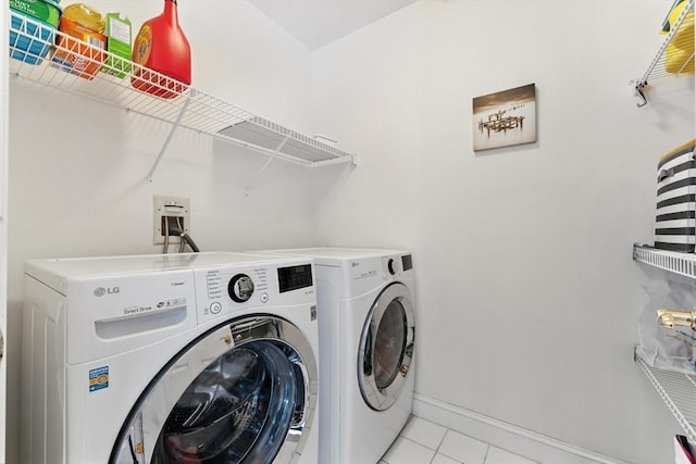22 Campbell Rd, Middleton, MA 01949 - washroom with washing machine and dryer and light tile patterned floors