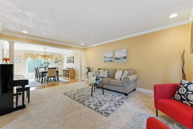 22 Campbell Rd, Middleton, MA 01949 - carpeted living room featuring ornate columns, ornamental molding, a chandelier, and recessed lighting