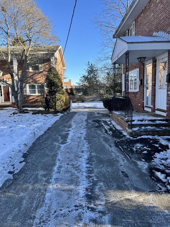 view of street featuring driveway