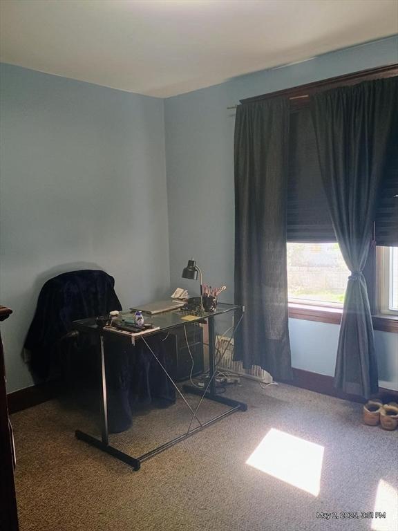 view of carpeted home office