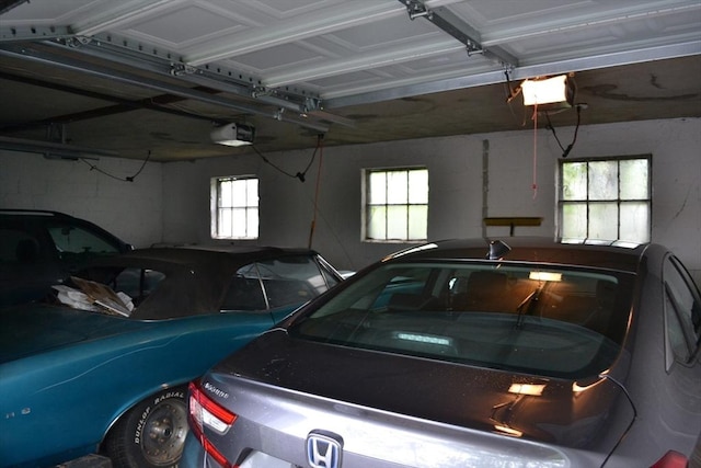garage featuring a garage door opener