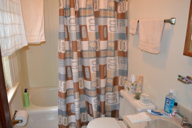 full bathroom featuring toilet and a sink