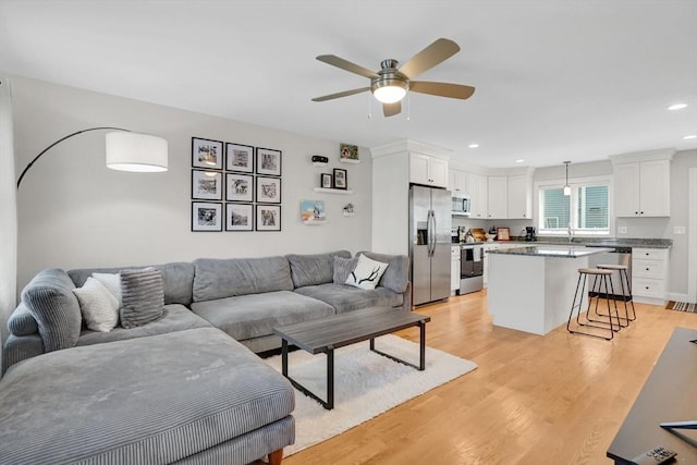 111 Union St Unit 8, Westfield, MA 01085 - living room featuring a ceiling fan, light wood finished floors, and recessed lighting
