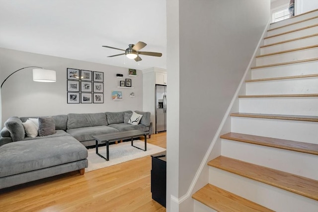 111 Union St Unit 8, Westfield, MA 01085 - living area with light wood-type flooring, stairway, and a ceiling fan