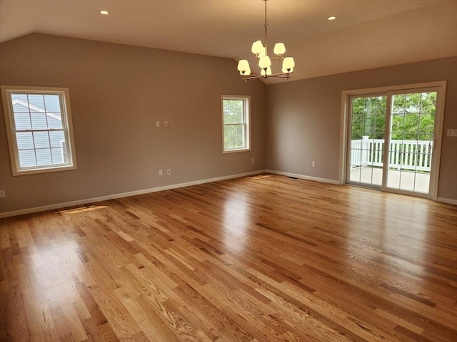 56 Kelly Ln, Lynn, MA 01904 - unfurnished room featuring a chandelier, vaulted ceiling, light wood-style floors, baseboards, and recessed lighting