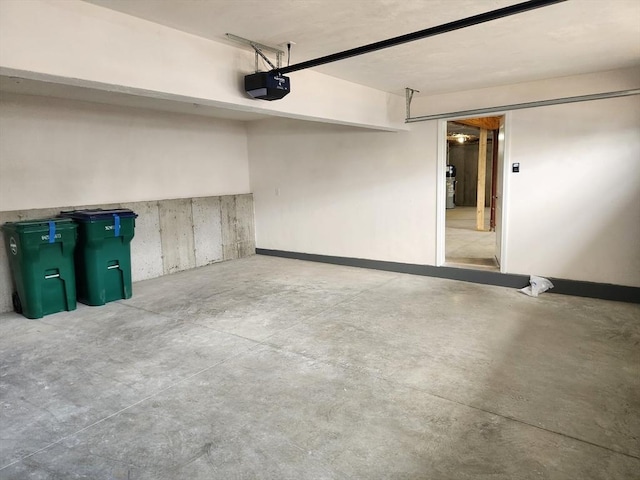 56 Kelly Ln, Lynn, MA 01904 - garage featuring a garage door opener