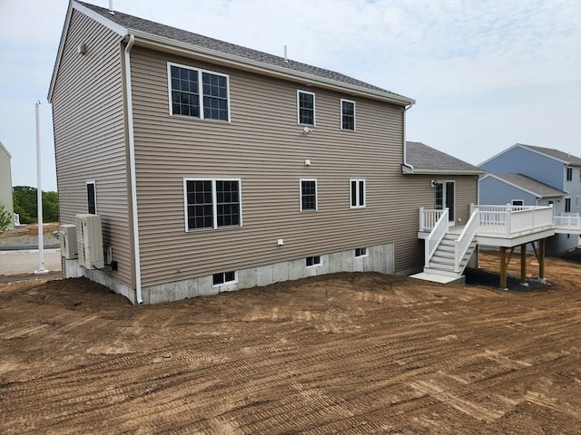 56 Kelly Ln, Lynn, MA 01904 - back of property featuring a wooden deck and stairway