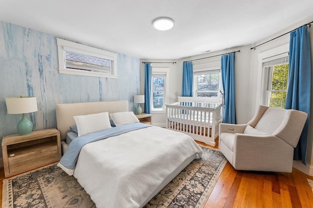 bedroom with wood finished floors