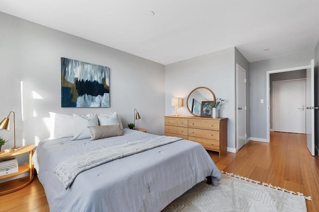 bedroom featuring hardwood / wood-style flooring