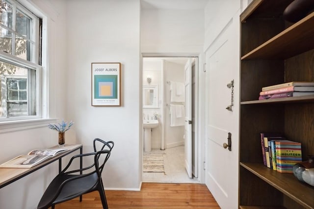 7 Linnaean St Unit 1, Cambridge, MA 02138 - home office featuring light wood-style flooring and baseboards