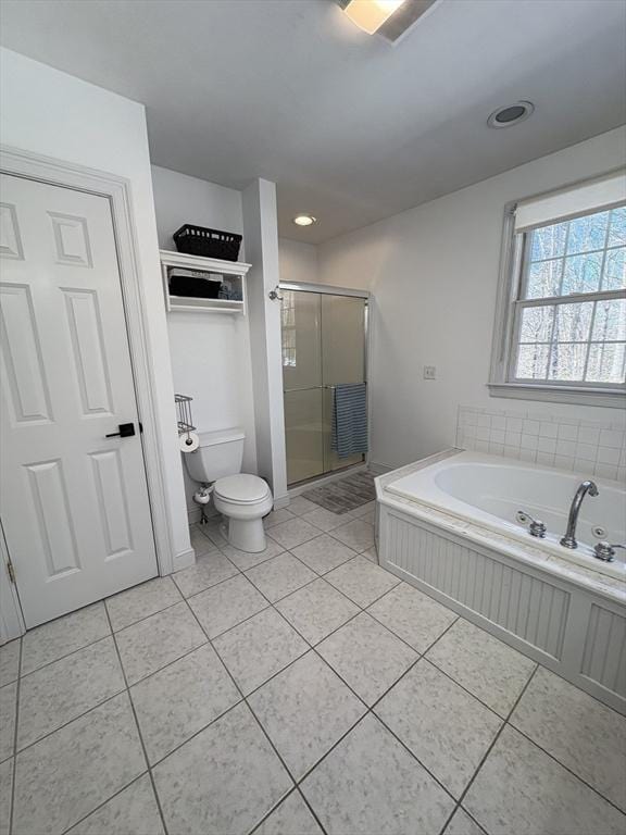 bathroom with recessed lighting, a bath, tile patterned floors, toilet, and a stall shower