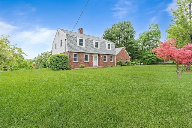 20 Highwood Way, North Andover, MA 01845 - dutch colonial with a gambrel roof, brick siding, a front yard, and a chimney