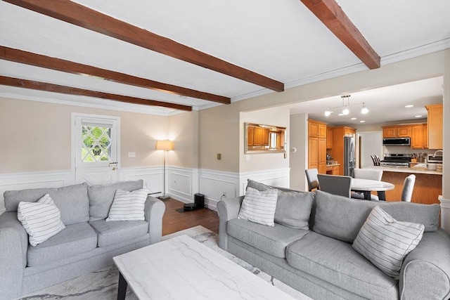 20 Highwood Way, North Andover, MA 01845 - living area with beamed ceiling, dark wood-type flooring, a wainscoted wall, and crown molding