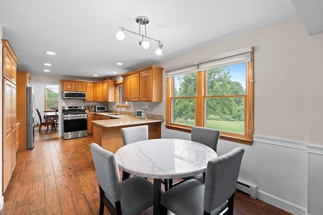 20 Highwood Way, North Andover, MA 01845 - dining room with a baseboard radiator, hardwood / wood-style floors, wainscoting, and recessed lighting