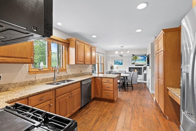 20 Highwood Way, North Andover, MA 01845 - kitchen with appliances with stainless steel finishes, a sink, dark wood-style flooring, tasteful backsplash, and recessed lighting