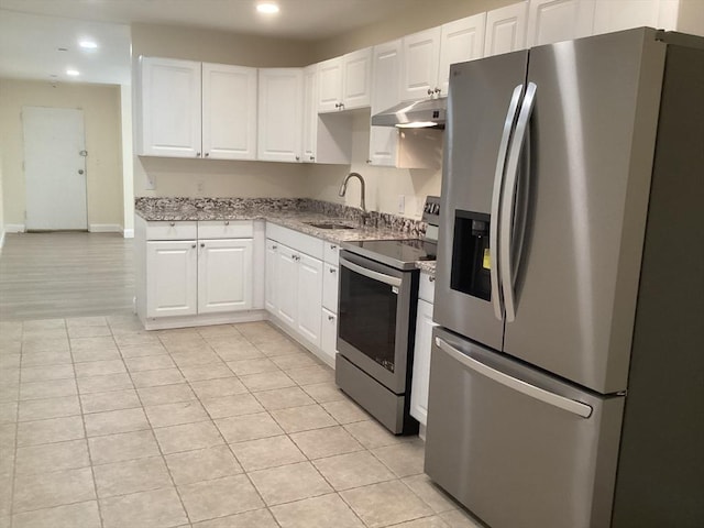 566 Commonwealth Ave # 101, Boston, MA 02215 - kitchen featuring stainless steel appliances, recessed lighting, under cabinet range hood, white cabinets, and light stone countertops