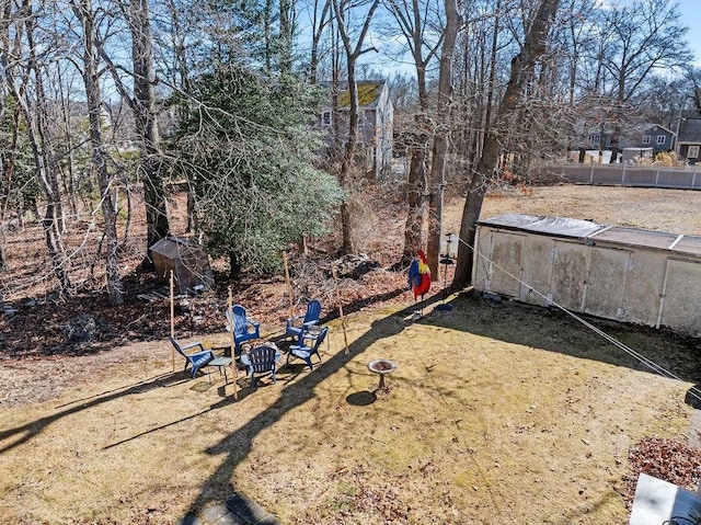 view of yard featuring a fire pit