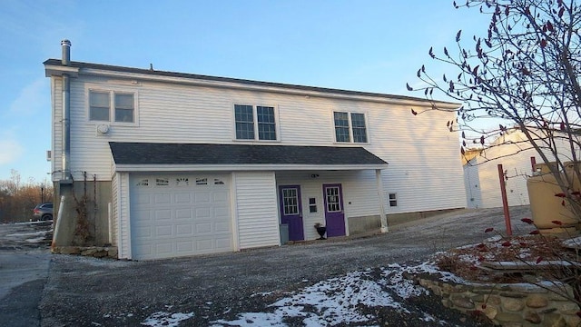 view of front of home with a garage