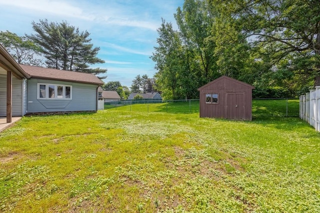 121 Donlyn Dr, Chicopee, MA 01013 - fenced backyard featuring a shed