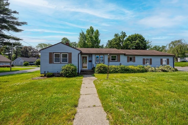 121 Donlyn Dr, Chicopee, MA 01013 - view of front of home with a front lawn