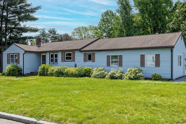 121 Donlyn Dr, Chicopee, MA 01013 - ranch-style house with a chimney, a front lawn, and a shingled roof