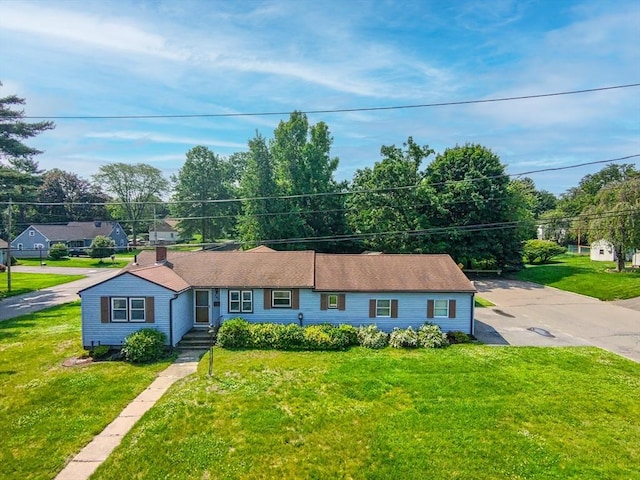 121 Donlyn Dr, Chicopee, MA 01013 - single story home featuring a front lawn