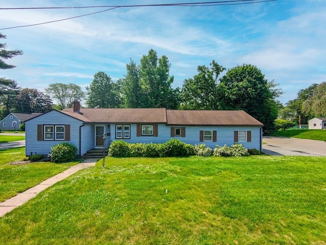 121 Donlyn Dr, Chicopee, MA 01013 - ranch-style home featuring a chimney and a front lawn