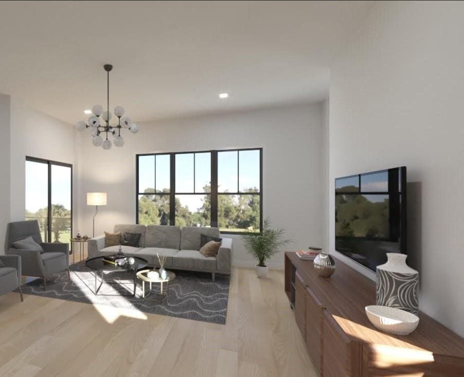 2 Weld Hill St Unit 301, Boston, MA 02130 - living room featuring healthy amount of natural light, a chandelier, light wood-style flooring, and recessed lighting