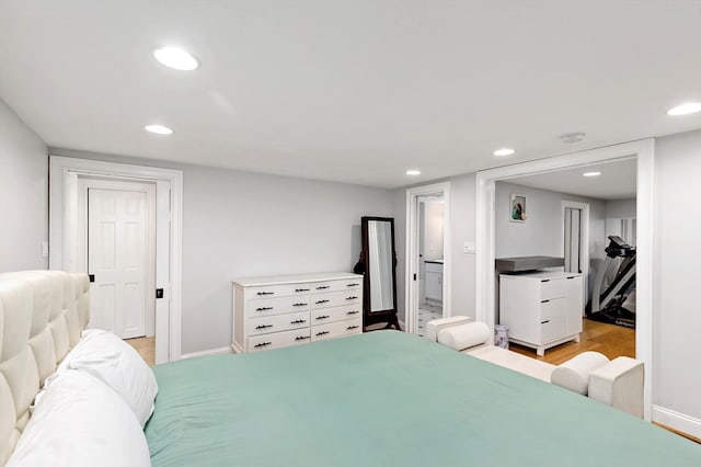 bedroom with light hardwood / wood-style floors