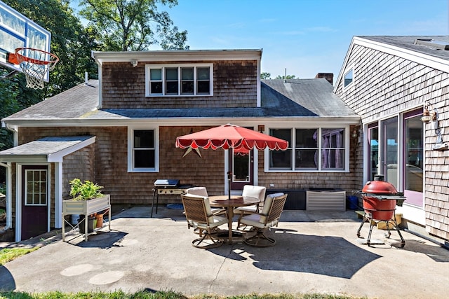 view of patio with a grill