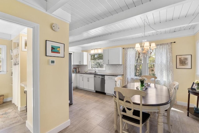 11 White Oak Trl, Barnstable, MA 02632 - dining area featuring beam ceiling, baseboards, a chandelier, and wooden ceiling