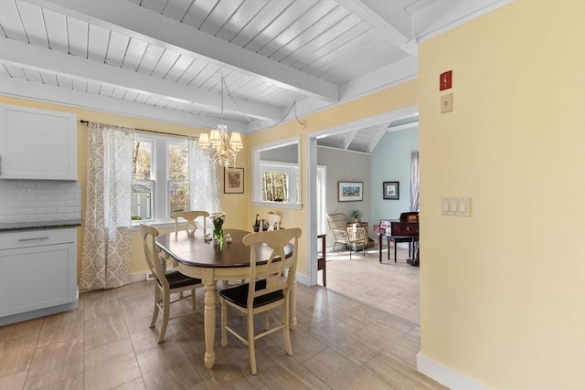 11 White Oak Trl, Barnstable, MA 02632 - dining space featuring beam ceiling, a chandelier, baseboards, and wooden ceiling