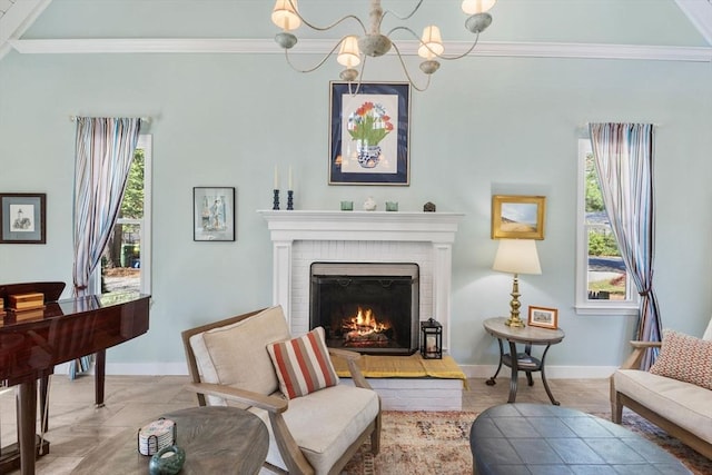 11 White Oak Trl, Barnstable, MA 02632 - sitting room with crown molding, a chandelier, a brick fireplace, and baseboards