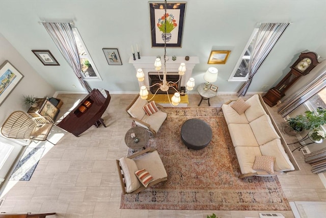 11 White Oak Trl, Barnstable, MA 02632 - living room with baseboards and a chandelier
