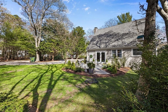 11 White Oak Trl, Barnstable, MA 02632 - view of green lawn featuring french doors and a patio area