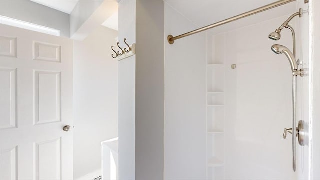 bathroom featuring walk in shower