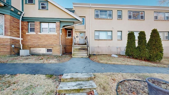 view of front of property with central AC unit