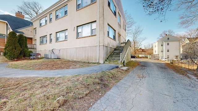 view of home's exterior featuring central AC