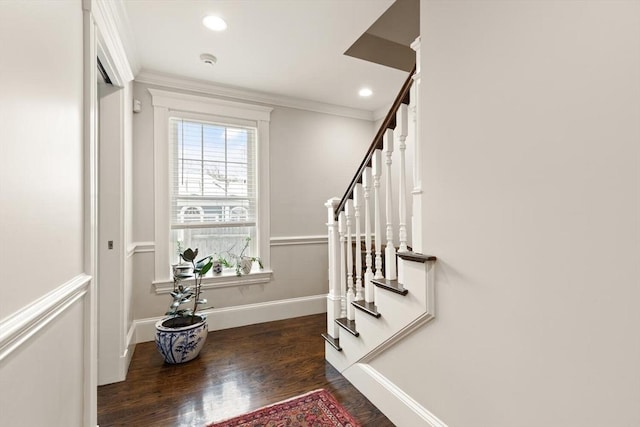 foyer featuring dark wood-style floors, crown molding, recessed lighting, stairway, and baseboards