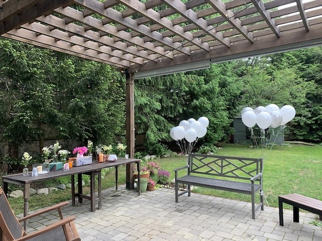 exterior space with outdoor dining area, fence, and a pergola