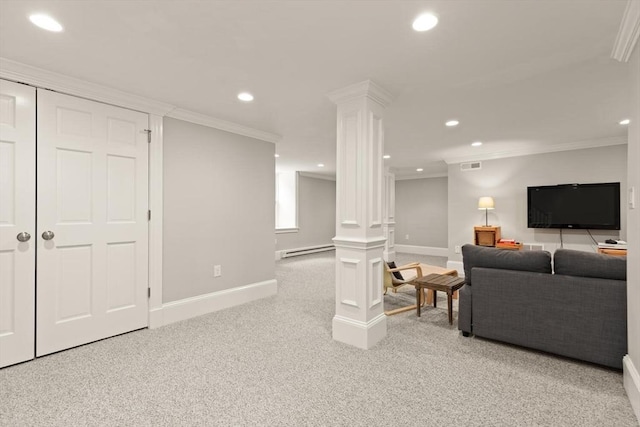 living area featuring ornamental molding, baseboard heating, recessed lighting, and ornate columns