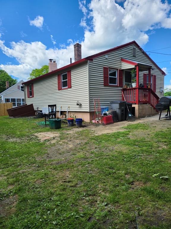 18 Pond St, Gardner, MA 01440 - back of property featuring a chimney and a yard