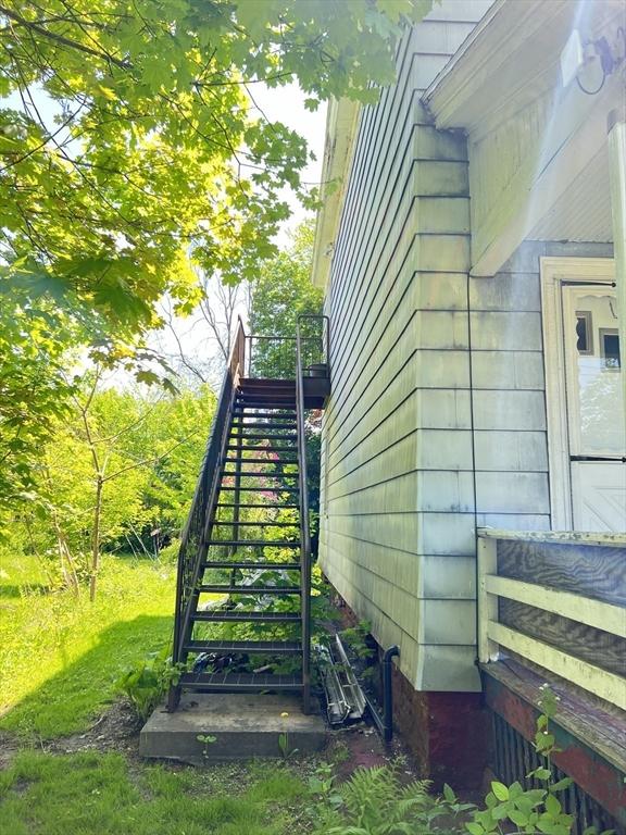 1 Barber Ave, Greenfield, MA 01301 - view of side of home with stairway